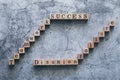 Top view of wood cube letter word of Teamwork, SUCCESS, Disunion and failure. Idea of motivation or inspiration in business vision