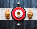 Top view of a wood table full of cakes, fruits, coffee, biscuits Royalty Free Stock Photo