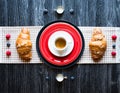 Top view of a wood table full of cakes, fruits, coffee, biscuits Royalty Free Stock Photo