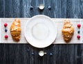 Top view of a wood table full of cakes, fruits, coffee, biscuits Royalty Free Stock Photo