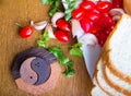 Top-view of a wood table with olives tomatoes bread Royalty Free Stock Photo