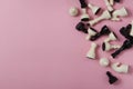 Top view of chess pieces on the bright pink background.Empty space Royalty Free Stock Photo