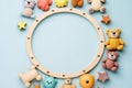 Top view of wooden children's toys on a light blue background