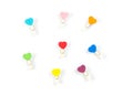 Top view Wooden colorful Paper Clip Heart set isolate on white b