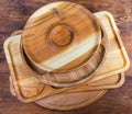 Top view of wooden compartment dishes and serving boards stack Royalty Free Stock Photo