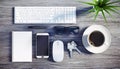 Top view of a wooden desktop with office accesoires