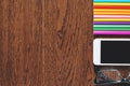 Wooden desk top with devices and supplies Royalty Free Stock Photo