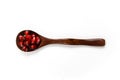 Top view. A wooden spoon with seeds in it. Wooden spoon with pomegranate seeds isolated on a white background. Fruit pomegranate. Royalty Free Stock Photo
