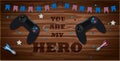 Top view of a wooden table with sports equipment. The inscription is you are my hero. Sports fan table with Darts