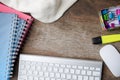 Top view of wooden working table with notepad and binder clips. Royalty Free Stock Photo