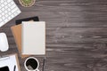 Top view wooden workspace office desk with computer and office supplies. Flat lay work table with blank notebook, keyboard, green Royalty Free Stock Photo