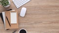 Top view wooden workspace office desk with computer and office supplies. Flat lay work table with blank notebook, keyboard, pen , Royalty Free Stock Photo