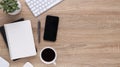 Top view wooden workspace office desk with computer and office supplies. Flat lay work table with blank notebook, keyboard, pen , Royalty Free Stock Photo