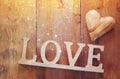 Top view of word LOVE from wooden letters and heart Royalty Free Stock Photo