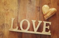 Top view of word LOVE from wooden letters and heart Royalty Free Stock Photo