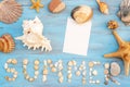 Top view word summer of sea shell on light blue wooden textured  for holiday time background Royalty Free Stock Photo