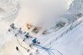 Top view of the work of four snow cannons for the production of artificial snow