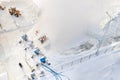 Top view of the work of four snow cannons for the production of artificial snow