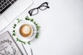 Top view of work place table, laptop with glasses notebook  and cup of coffee on white background Royalty Free Stock Photo