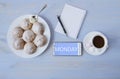 Top view of work space with phone and inscription with cup of coffee, cookies and notebook with copy space Royalty Free Stock Photo