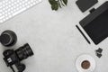 top view of work space photographer with digital camera, lenses Royalty Free Stock Photo
