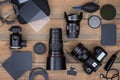top view of work space photographer with digital camera, lenses Royalty Free Stock Photo