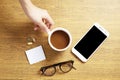 Top view of working table with cup of coffee ,medicine and laptop computer. Royalty Free Stock Photo