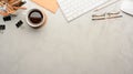 Top view of workspace with computer keyboard, supplies, coffee cup and copy space Royalty Free Stock Photo