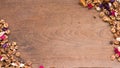 Top view workspace with dried flowers on wooden table background Royalty Free Stock Photo