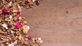 Top view workspace with dried flowers on wooden table background Royalty Free Stock Photo