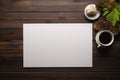 A top view of the workspace with a white empty card centered on the dark wooden background