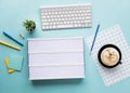 Top view of worktable with cinema light box and accessories.Business flat lay background.start a day