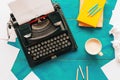 Top view of writer`s block concept with vintage classic typewriter on author`s desk