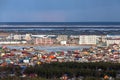 Top view of Yakutsk skyline with a lake in the evening