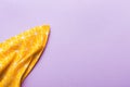 top view with yellow empty kitchen napkin isolated on table background. Folded cloth for mockup with copy space, Flat Royalty Free Stock Photo