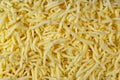 Top view of yellow grated mozzarella cheese