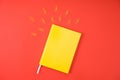 top view of yellow notebook with paper clips Royalty Free Stock Photo