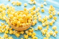 Top view yellow popcorn on blue wooden plank background Royalty Free Stock Photo