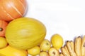 Top view of yellow vegetables and fruits, copy space. Isolated on white