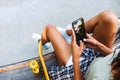 Top view of a young afro american girl using mobile phone Royalty Free Stock Photo