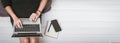 Top view of a young asian woman using laptop computer sitting on wooden floor at home , work from home concept Royalty Free Stock Photo