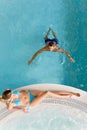 Top view - young couple relax in swimming pool