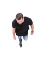 Top view. young man in black t-shirt stepping forward Royalty Free Stock Photo
