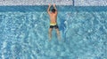 Top view young man relaxing in swimming pool with copy space Royalty Free Stock Photo