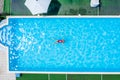 Top view of a young man swimming underwater in a pool Royalty Free Stock Photo