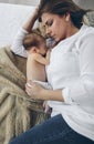Mother hugging her newborn baby girl Royalty Free Stock Photo