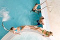 Top view - young people relax in swimming pool