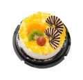 Top view yummy cake on white with grape orange kiwifruit and chocolate on top