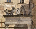 The top of The well of Griffins and Lions in the big square of Montepulciano, Italy. Royalty Free Stock Photo