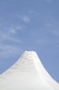 Top of white canvas tent on cloudy sky Royalty Free Stock Photo